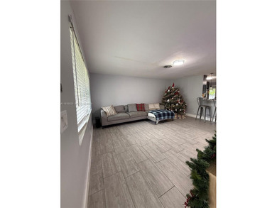 3/2 waterfront pool home in desirable Cooper City. Open-concept on Cooper Colony Country Club in Florida - for sale on GolfHomes.com, golf home, golf lot