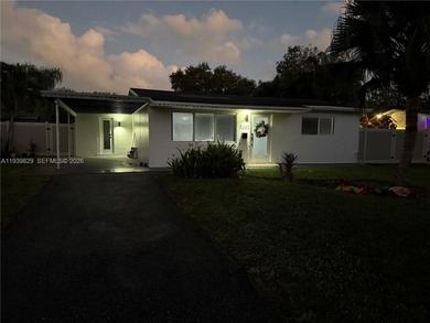3/2 waterfront pool home in desirable Cooper City. Open-concept on Cooper Colony Country Club in Florida - for sale on GolfHomes.com, golf home, golf lot