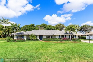 Welcome to 10871 Gleneagles Road, an inviting 4-bedroom on Pine Tree Golf Club in Florida - for sale on GolfHomes.com, golf home, golf lot