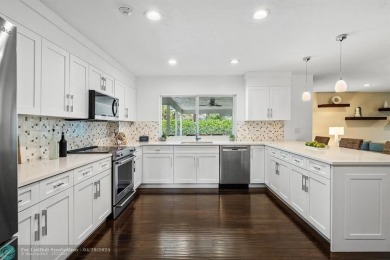 Welcome to 10871 Gleneagles Road, an inviting 4-bedroom on Pine Tree Golf Club in Florida - for sale on GolfHomes.com, golf home, golf lot