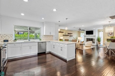 Welcome to 10871 Gleneagles Road, an inviting 4-bedroom on Pine Tree Golf Club in Florida - for sale on GolfHomes.com, golf home, golf lot