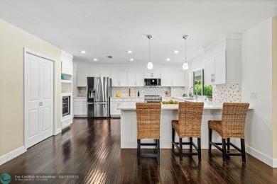 Welcome to 10871 Gleneagles Road, an inviting 4-bedroom on Pine Tree Golf Club in Florida - for sale on GolfHomes.com, golf home, golf lot