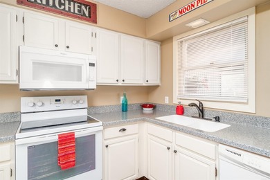 Enjoy beautiful Lake DeSoto views from the spacious deck of this on DeSoto Golf Course in Arkansas - for sale on GolfHomes.com, golf home, golf lot