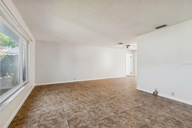 Drive down the winding, tree-lined streets of Fairway Springs to on Seven Springs Golf and Country Club in Florida - for sale on GolfHomes.com, golf home, golf lot