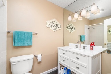 Enjoy beautiful Lake DeSoto views from the spacious deck of this on DeSoto Golf Course in Arkansas - for sale on GolfHomes.com, golf home, golf lot