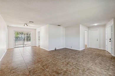 Drive down the winding, tree-lined streets of Fairway Springs to on Seven Springs Golf and Country Club in Florida - for sale on GolfHomes.com, golf home, golf lot