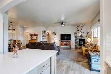 A meticulous home offering a seamless open-concept design with on Hunters Point Golf Club in Idaho - for sale on GolfHomes.com, golf home, golf lot