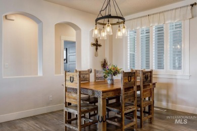 A meticulous home offering a seamless open-concept design with on Hunters Point Golf Club in Idaho - for sale on GolfHomes.com, golf home, golf lot