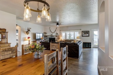 A meticulous home offering a seamless open-concept design with on Hunters Point Golf Club in Idaho - for sale on GolfHomes.com, golf home, golf lot