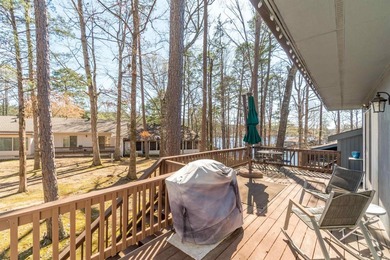 Enjoy beautiful Lake DeSoto views from the spacious deck of this on DeSoto Golf Course in Arkansas - for sale on GolfHomes.com, golf home, golf lot