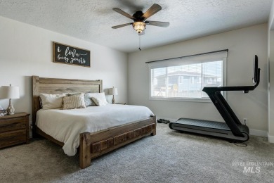 A meticulous home offering a seamless open-concept design with on Hunters Point Golf Club in Idaho - for sale on GolfHomes.com, golf home, golf lot