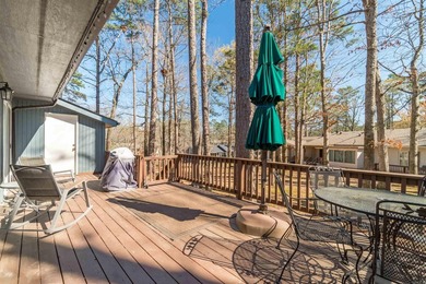 Enjoy beautiful Lake DeSoto views from the spacious deck of this on DeSoto Golf Course in Arkansas - for sale on GolfHomes.com, golf home, golf lot