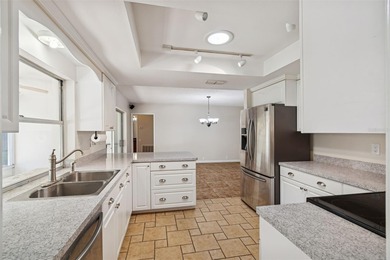 Drive down the winding, tree-lined streets of Fairway Springs to on Seven Springs Golf and Country Club in Florida - for sale on GolfHomes.com, golf home, golf lot