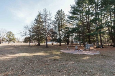 Welcome to this charming manufactured home, situated on over an on Sand Valley Golf Course in Wisconsin - for sale on GolfHomes.com, golf home, golf lot