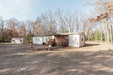 Welcome to this charming manufactured home, situated on over an on Sand Valley Golf Course in Wisconsin - for sale on GolfHomes.com, golf home, golf lot