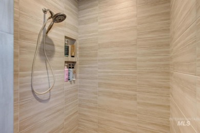 A meticulous home offering a seamless open-concept design with on Hunters Point Golf Club in Idaho - for sale on GolfHomes.com, golf home, golf lot