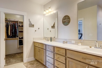A meticulous home offering a seamless open-concept design with on Hunters Point Golf Club in Idaho - for sale on GolfHomes.com, golf home, golf lot