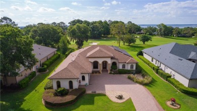 This home comes with the included breathtaking golf course views on Harbor Hills Country Club in Florida - for sale on GolfHomes.com, golf home, golf lot