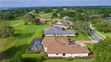 This home comes with the included breathtaking golf course views on Harbor Hills Country Club in Florida - for sale on GolfHomes.com, golf home, golf lot