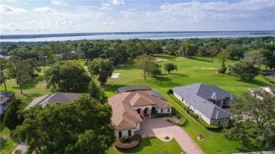 This home comes with the included breathtaking golf course views on Harbor Hills Country Club in Florida - for sale on GolfHomes.com, golf home, golf lot