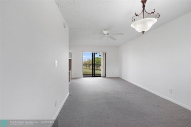 Top-floor 2BD/2BA condo in Sunrise Lakes Phase 4, a 55+ on Sunrise Lakes Phase IV Golf Course in Florida - for sale on GolfHomes.com, golf home, golf lot