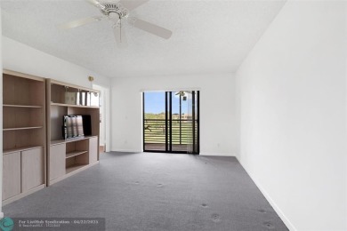 Top-floor 2BD/2BA condo in Sunrise Lakes Phase 4, a 55+ on Sunrise Lakes Phase IV Golf Course in Florida - for sale on GolfHomes.com, golf home, golf lot