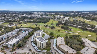 Priced to sell and in need of TLC unusually large condominium on East Bay Golf Club in Florida - for sale on GolfHomes.com, golf home, golf lot