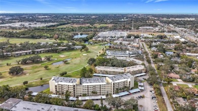 Priced to sell and in need of TLC unusually large condominium on East Bay Golf Club in Florida - for sale on GolfHomes.com, golf home, golf lot