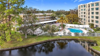 Priced to sell and in need of TLC unusually large condominium on East Bay Golf Club in Florida - for sale on GolfHomes.com, golf home, golf lot