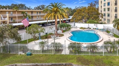 Priced to sell and in need of TLC unusually large condominium on East Bay Golf Club in Florida - for sale on GolfHomes.com, golf home, golf lot