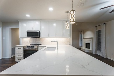 Welcome to easy living in sought-after Pecan Plantation--where on Pecan Plantation Country Club in Texas - for sale on GolfHomes.com, golf home, golf lot