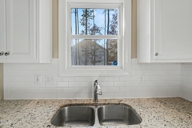 This Move-In Ready Home Has an Easy Flowing Open Concept Layout on The Neuse Golf Club in North Carolina - for sale on GolfHomes.com, golf home, golf lot