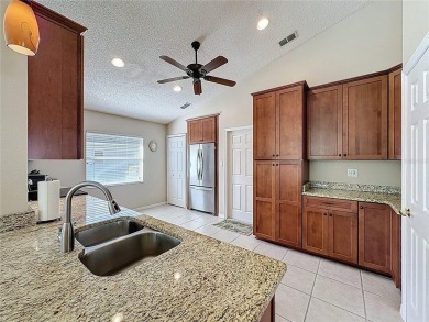 One of a kind expanded Canterbury model home on large golf on Kings Ridge Golf Club in Florida - for sale on GolfHomes.com, golf home, golf lot
