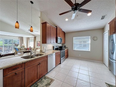 One of a kind expanded Canterbury model home on large golf on Kings Ridge Golf Club in Florida - for sale on GolfHomes.com, golf home, golf lot
