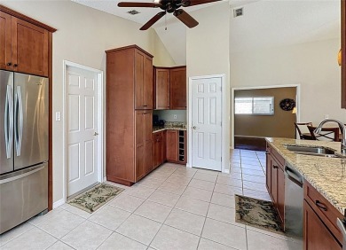 One of a kind expanded Canterbury model home on large golf on Kings Ridge Golf Club in Florida - for sale on GolfHomes.com, golf home, golf lot