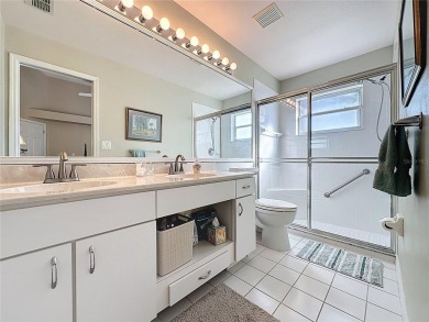 One of a kind expanded Canterbury model home on large golf on Kings Ridge Golf Club in Florida - for sale on GolfHomes.com, golf home, golf lot