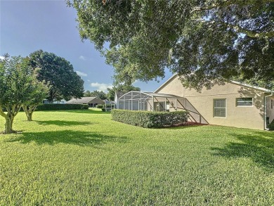 One of a kind expanded Canterbury model home on large golf on Kings Ridge Golf Club in Florida - for sale on GolfHomes.com, golf home, golf lot
