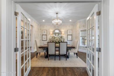 Prepare to be wowed! A must see in person, this custom brick on Members Club At St. James Plantation in North Carolina - for sale on GolfHomes.com, golf home, golf lot