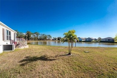 Beautifully Finished Waterfront Home featuring 2 bedrooms and 2 on Kings Gate Golf Club in Florida - for sale on GolfHomes.com, golf home, golf lot