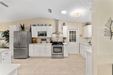 Don't miss this beautifully upgraded 3-bedroom, 2-bath home with on Orange Blossom Hills Golf and Country Club in Florida - for sale on GolfHomes.com, golf home, golf lot