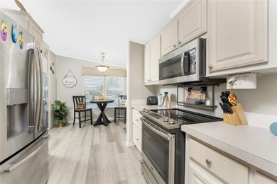 Beautifully Finished Waterfront Home featuring 2 bedrooms and 2 on Kings Gate Golf Club in Florida - for sale on GolfHomes.com, golf home, golf lot