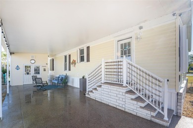 Beautifully Finished Waterfront Home featuring 2 bedrooms and 2 on Kings Gate Golf Club in Florida - for sale on GolfHomes.com, golf home, golf lot