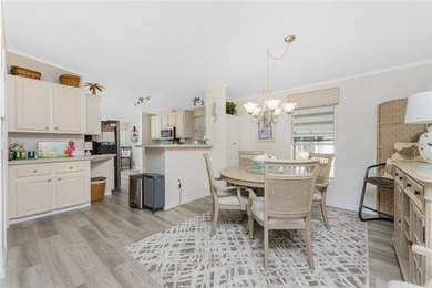 Beautifully Finished Waterfront Home featuring 2 bedrooms and 2 on Kings Gate Golf Club in Florida - for sale on GolfHomes.com, golf home, golf lot