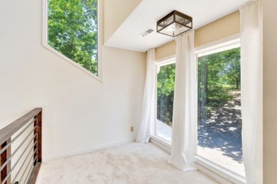 Upon entry, you're greeted by updated marble LVT flooring on Nob North Golf Course in Georgia - for sale on GolfHomes.com, golf home, golf lot