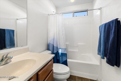 View this stunning, 1966 sq.ft. 4-bedroom, 3-bath residence in on StoneRidge Golf Course in Arizona - for sale on GolfHomes.com, golf home, golf lot