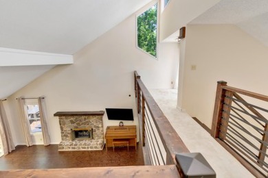 Upon entry, you're greeted by updated marble LVT flooring on Nob North Golf Course in Georgia - for sale on GolfHomes.com, golf home, golf lot