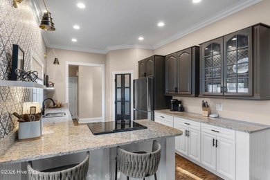 Prepare to be wowed! A must see in person, this custom brick on Members Club At St. James Plantation in North Carolina - for sale on GolfHomes.com, golf home, golf lot