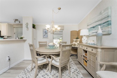 Beautifully Finished Waterfront Home featuring 2 bedrooms and 2 on Kings Gate Golf Club in Florida - for sale on GolfHomes.com, golf home, golf lot