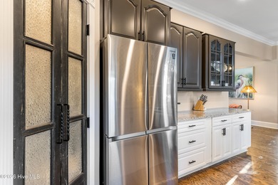 Prepare to be wowed! A must see in person, this custom brick on Members Club At St. James Plantation in North Carolina - for sale on GolfHomes.com, golf home, golf lot