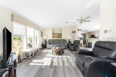 Beautifully Finished Waterfront Home featuring 2 bedrooms and 2 on Kings Gate Golf Club in Florida - for sale on GolfHomes.com, golf home, golf lot